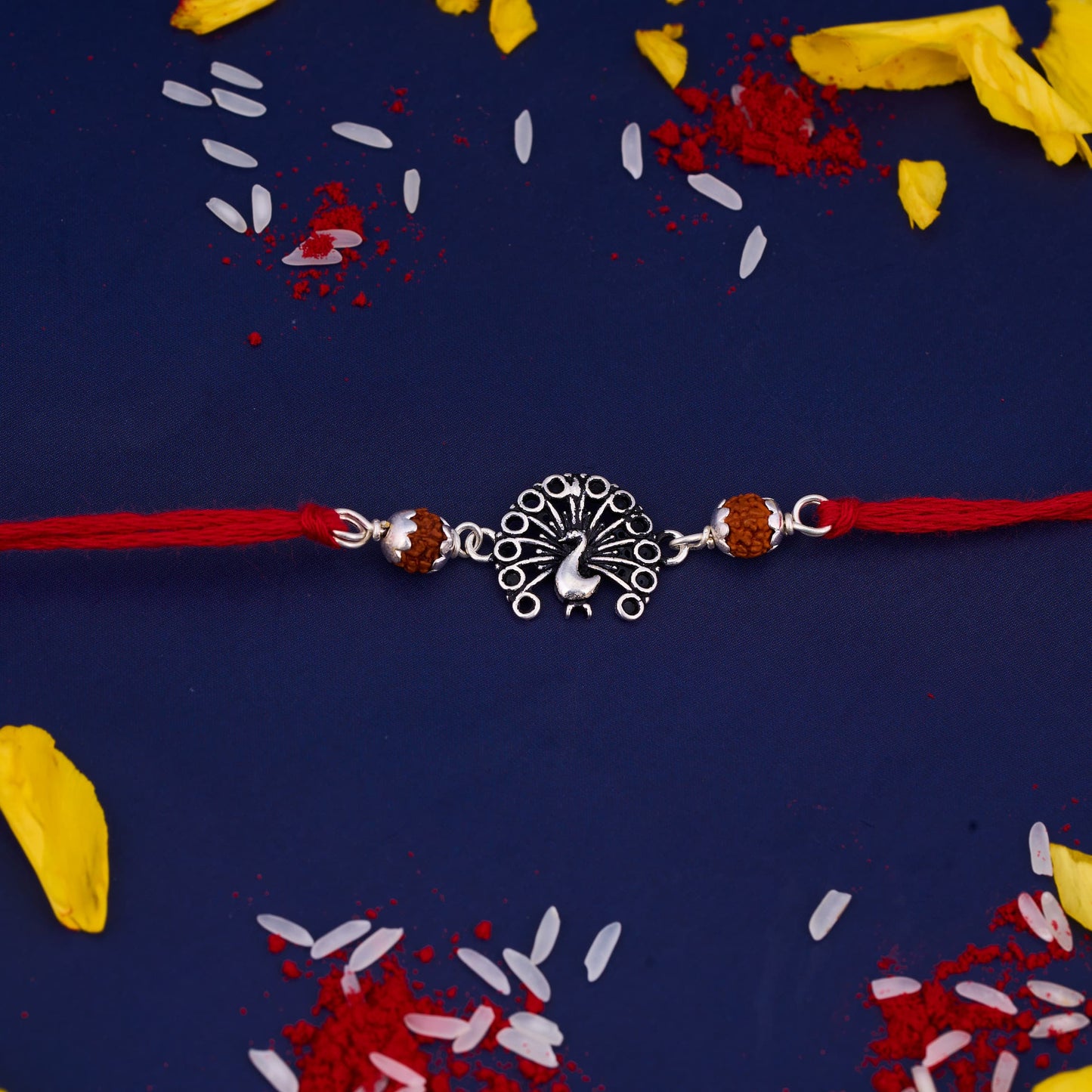 Silver Rudraksh Rakhi with Peacock Design