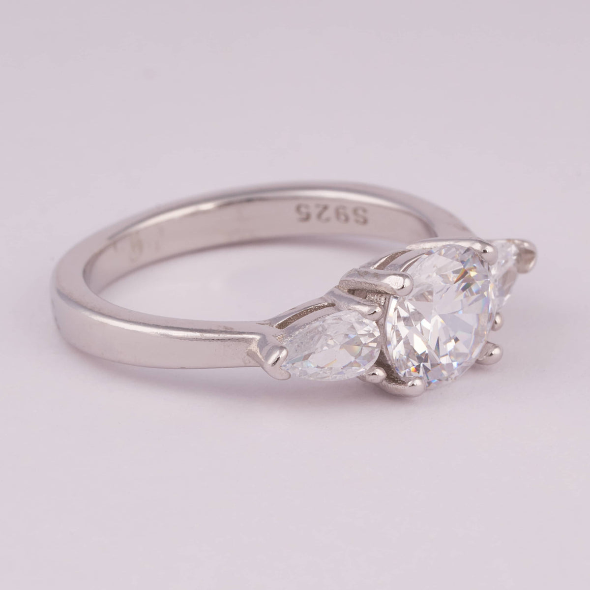 Three-Stone Silver Ring with Round and Marquise Stones