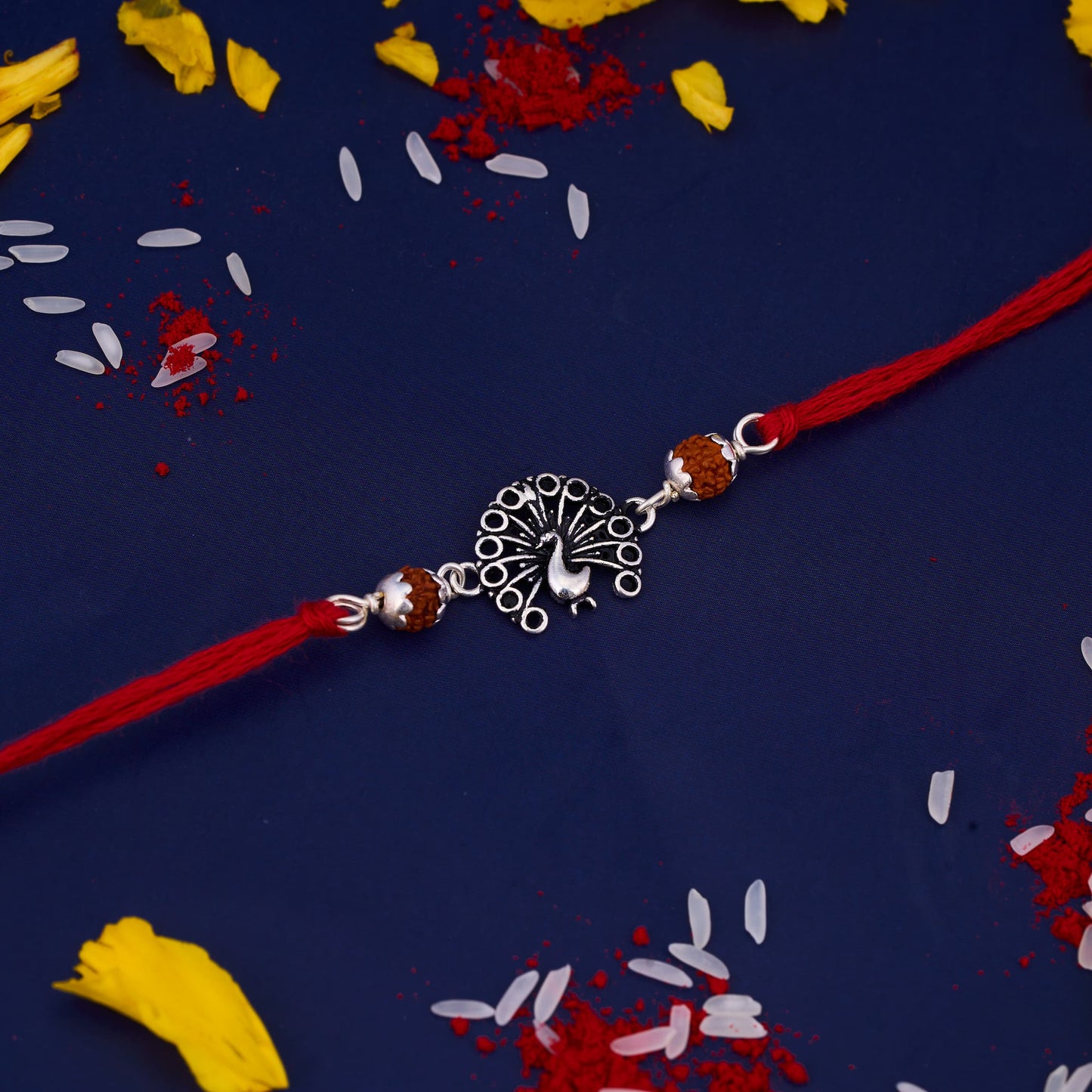 Silver Rudraksh Rakhi with Peacock Design