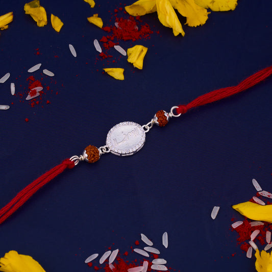 Silver Rudraksh Rakhi with written Ram with Diamond border