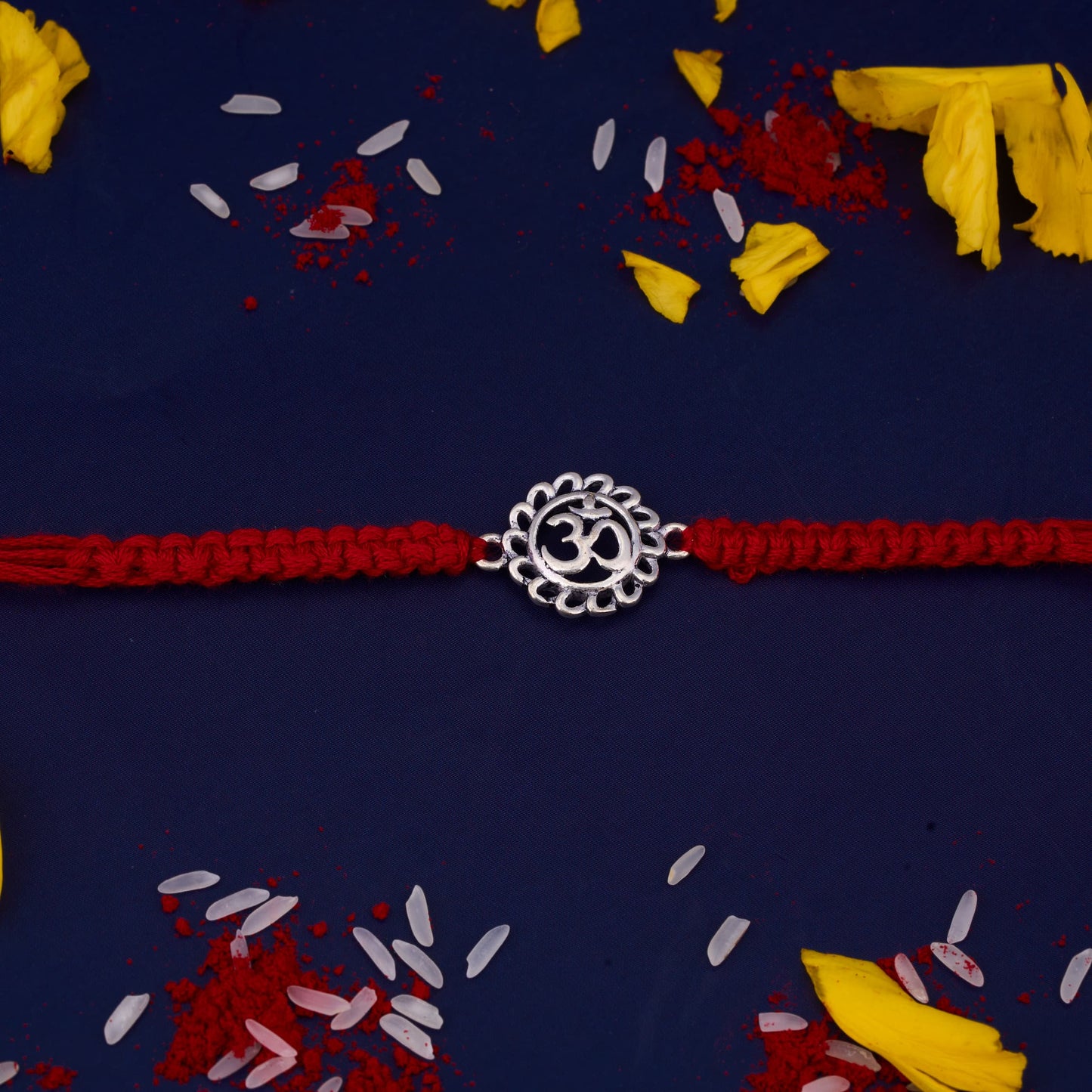 Silver Om Rakhi with Round Design