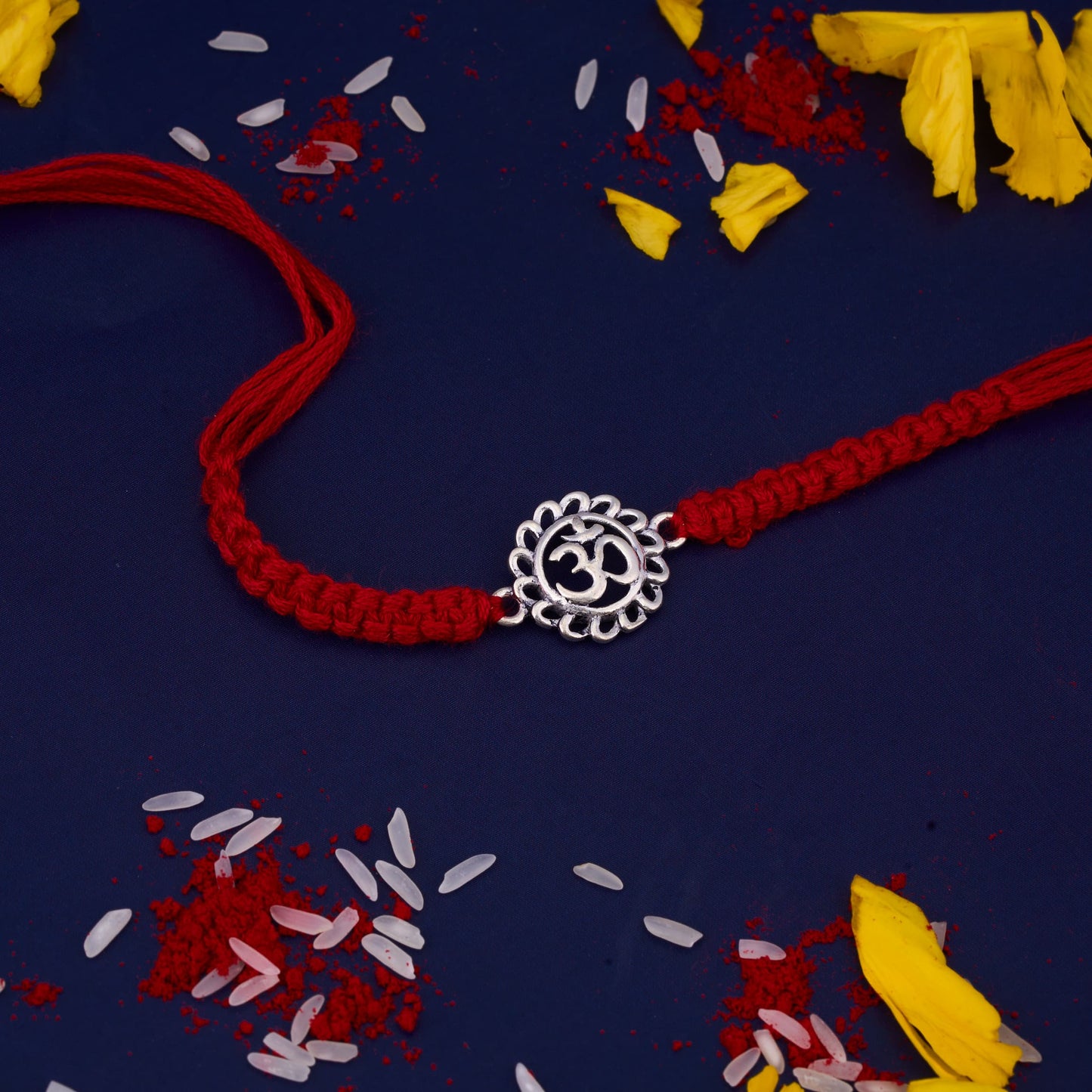 Silver Om Rakhi with Round Design