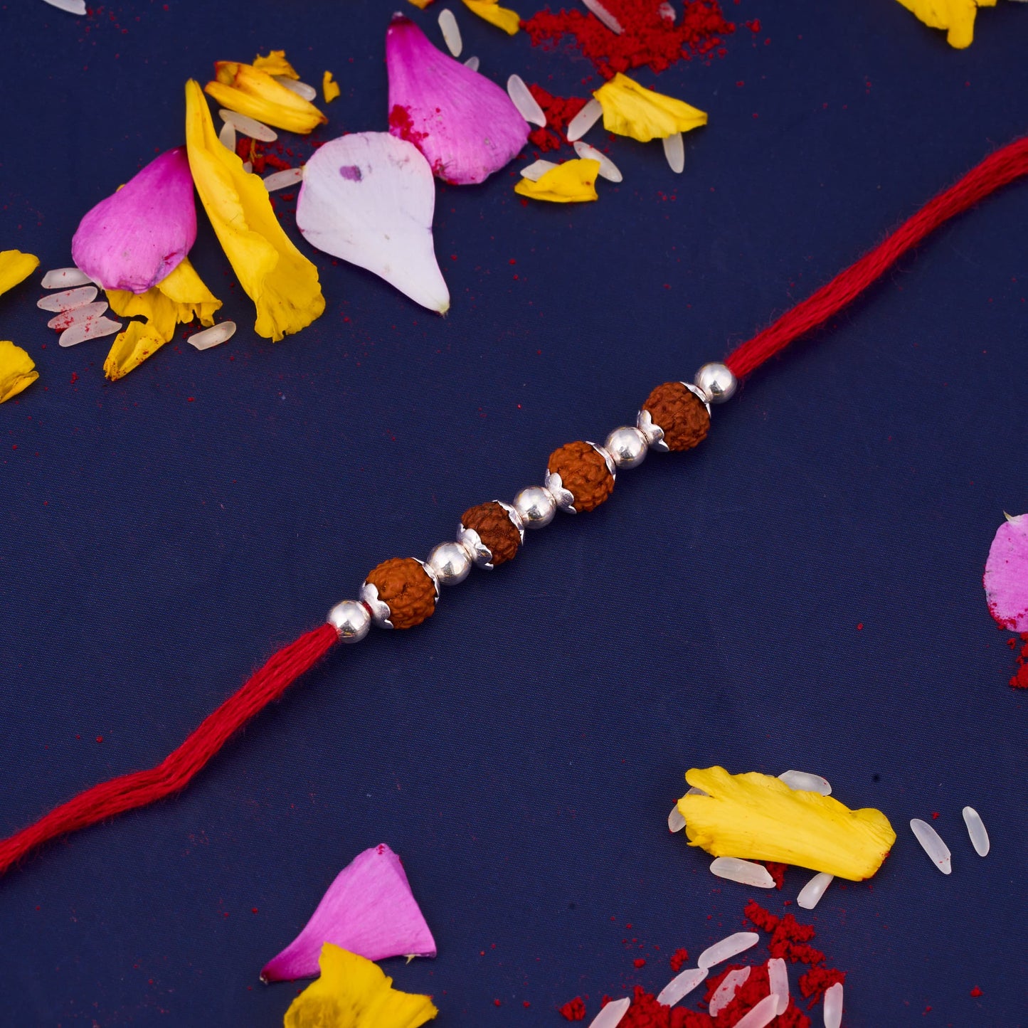 Silver Rudraksh Rakhi with four Beads