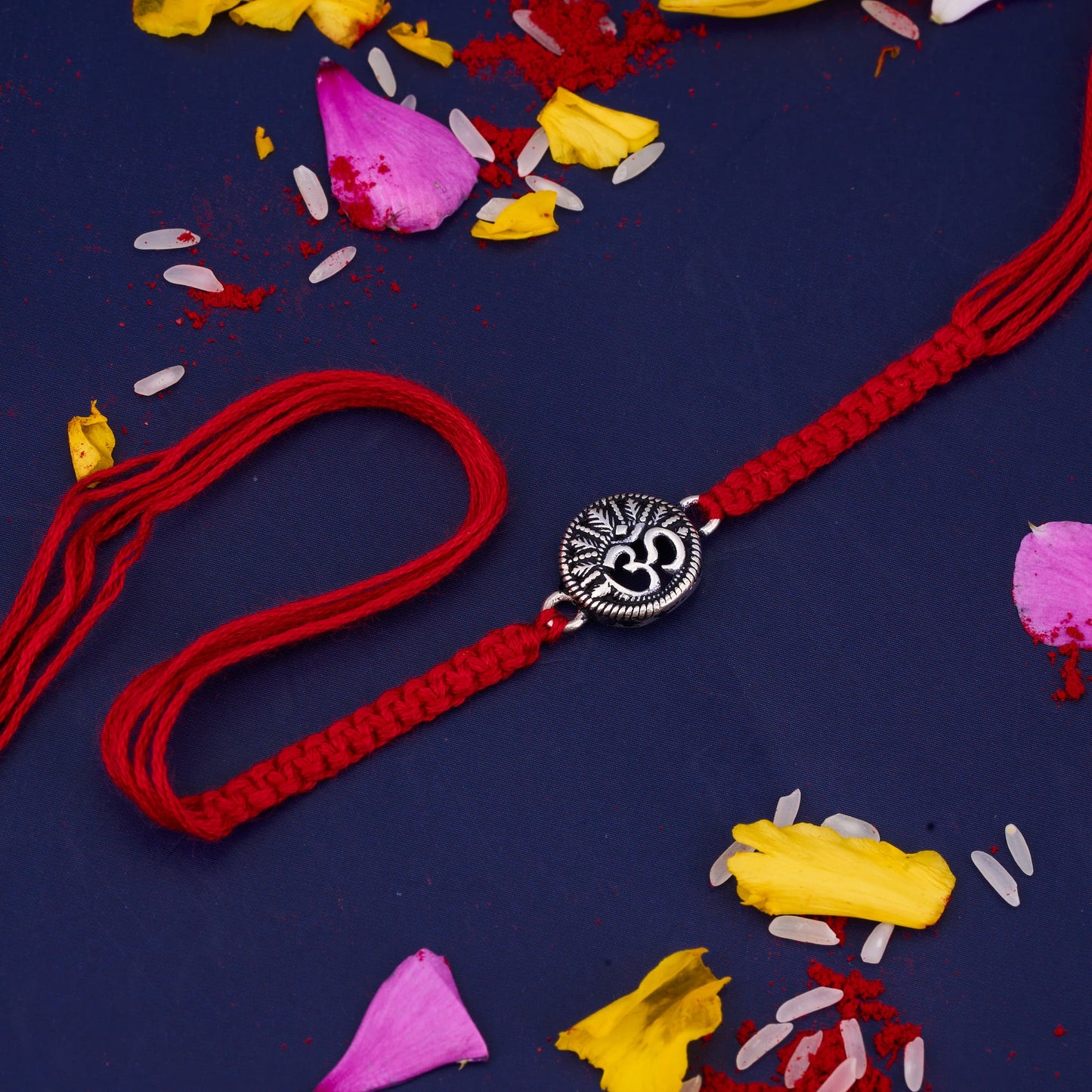 Silver Om Rakhi with Round Design