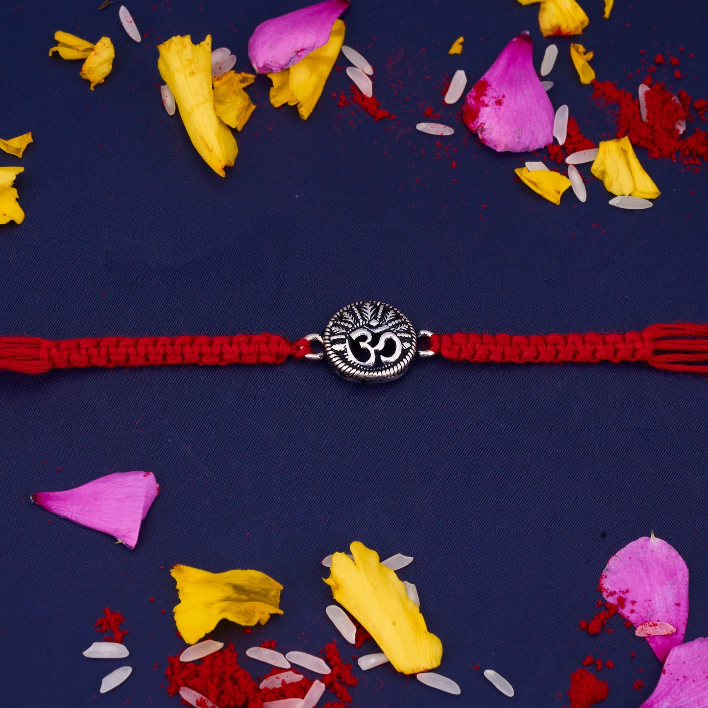 Silver Om Rakhi with Round Design