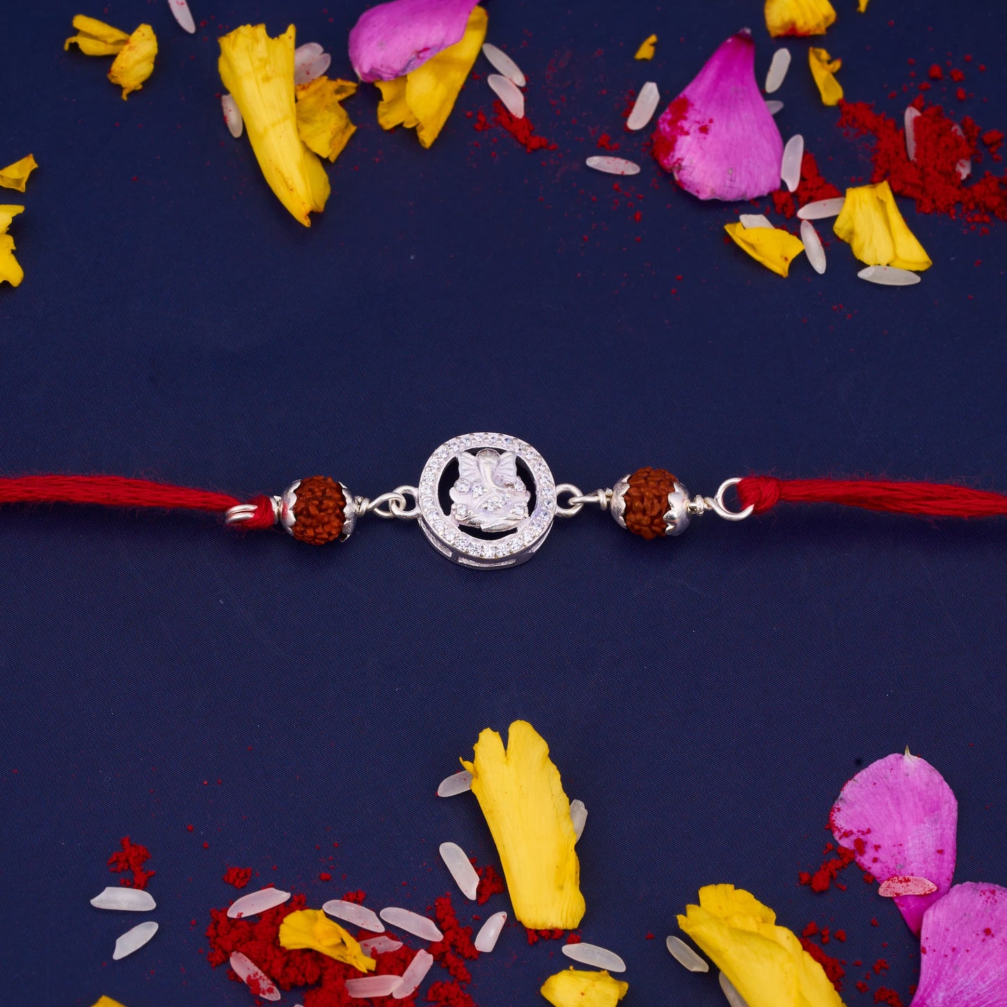 Silver Ganeshji Diamond Rakhi with Two Rudraksh