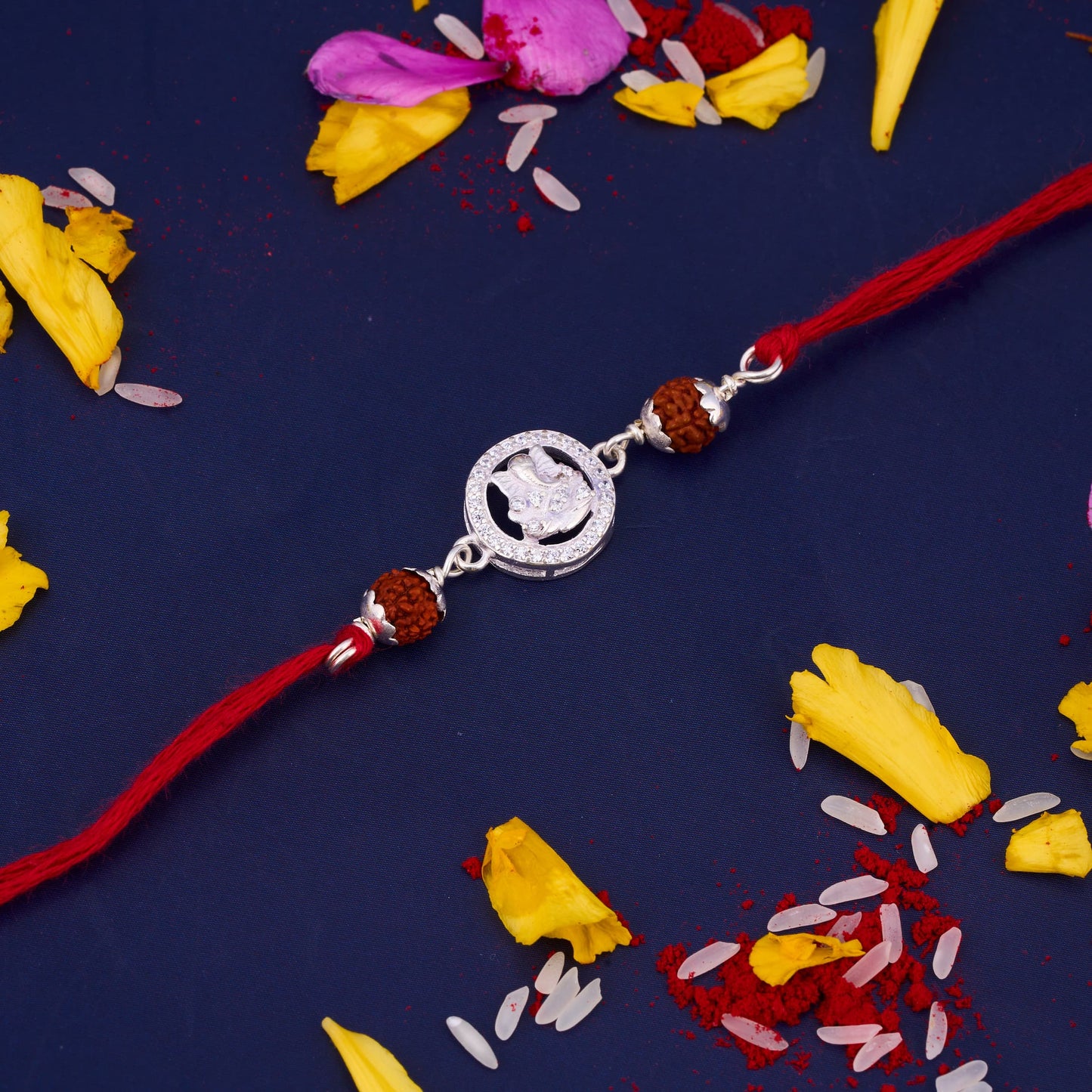 Silver Ganeshji Diamond Rakhi with Two Rudraksh