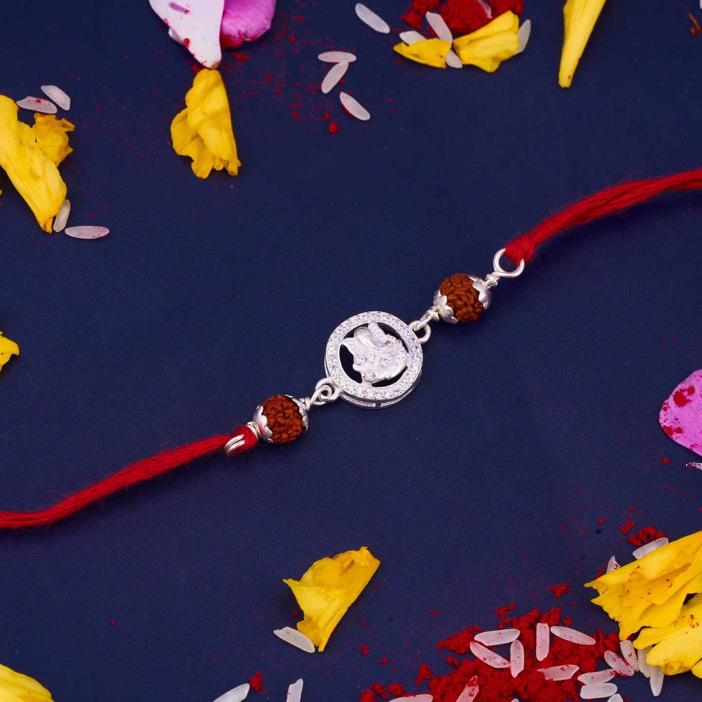 Silver Ganeshji Diamond Rakhi with Two Rudraksh