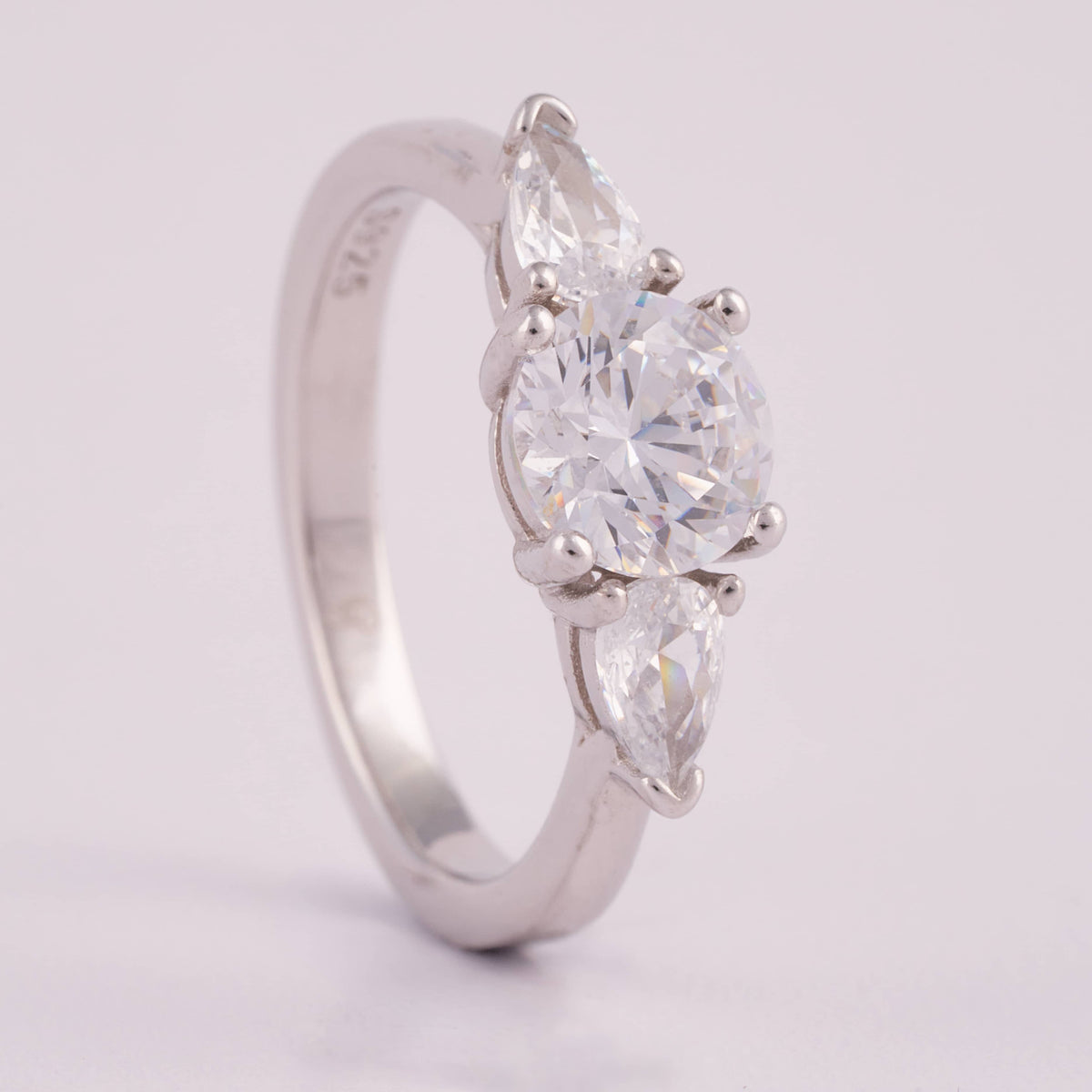 Three-Stone Silver Ring with Round and Marquise Stones