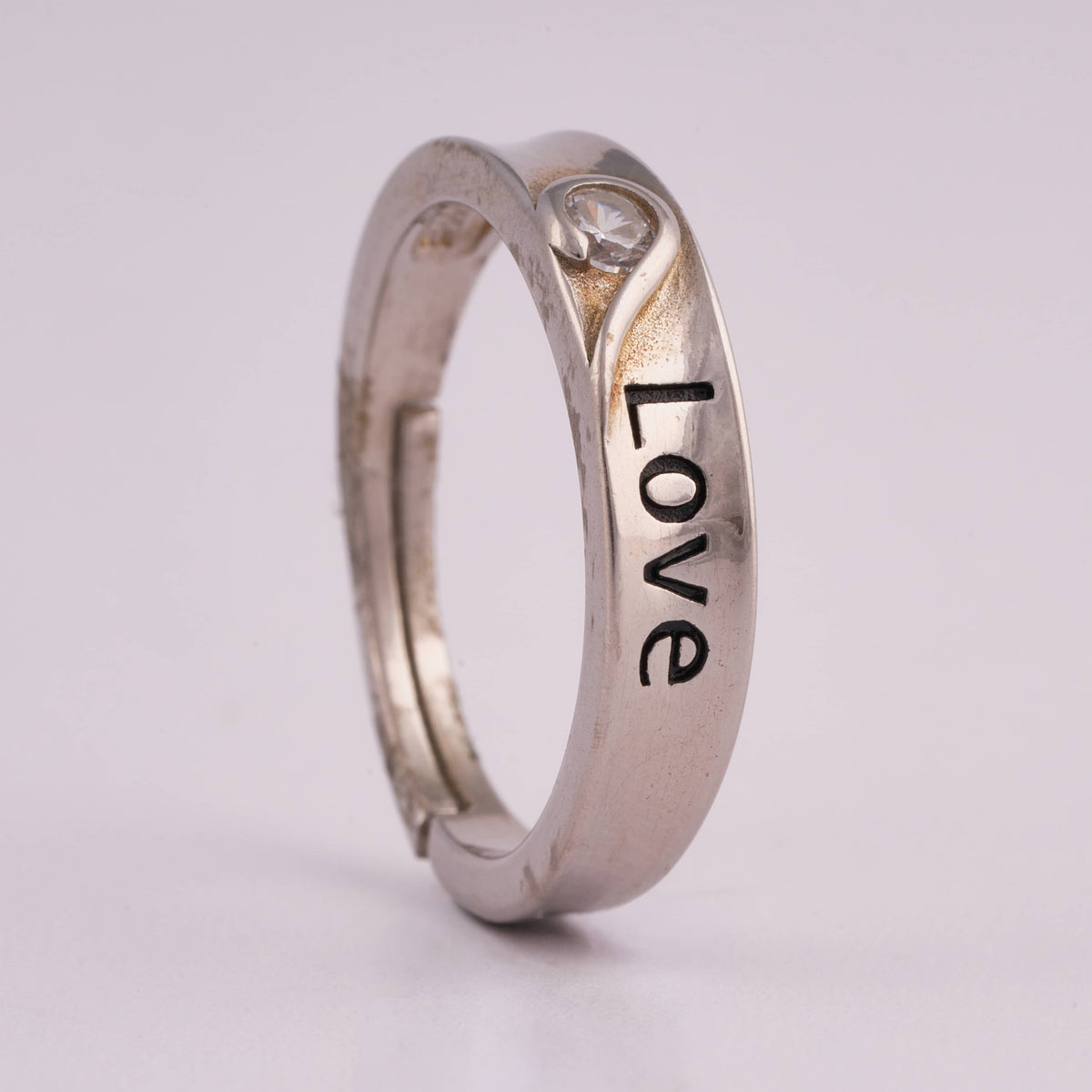 Silver Ring with 'LOVE' Engraving and Solitaire Stone