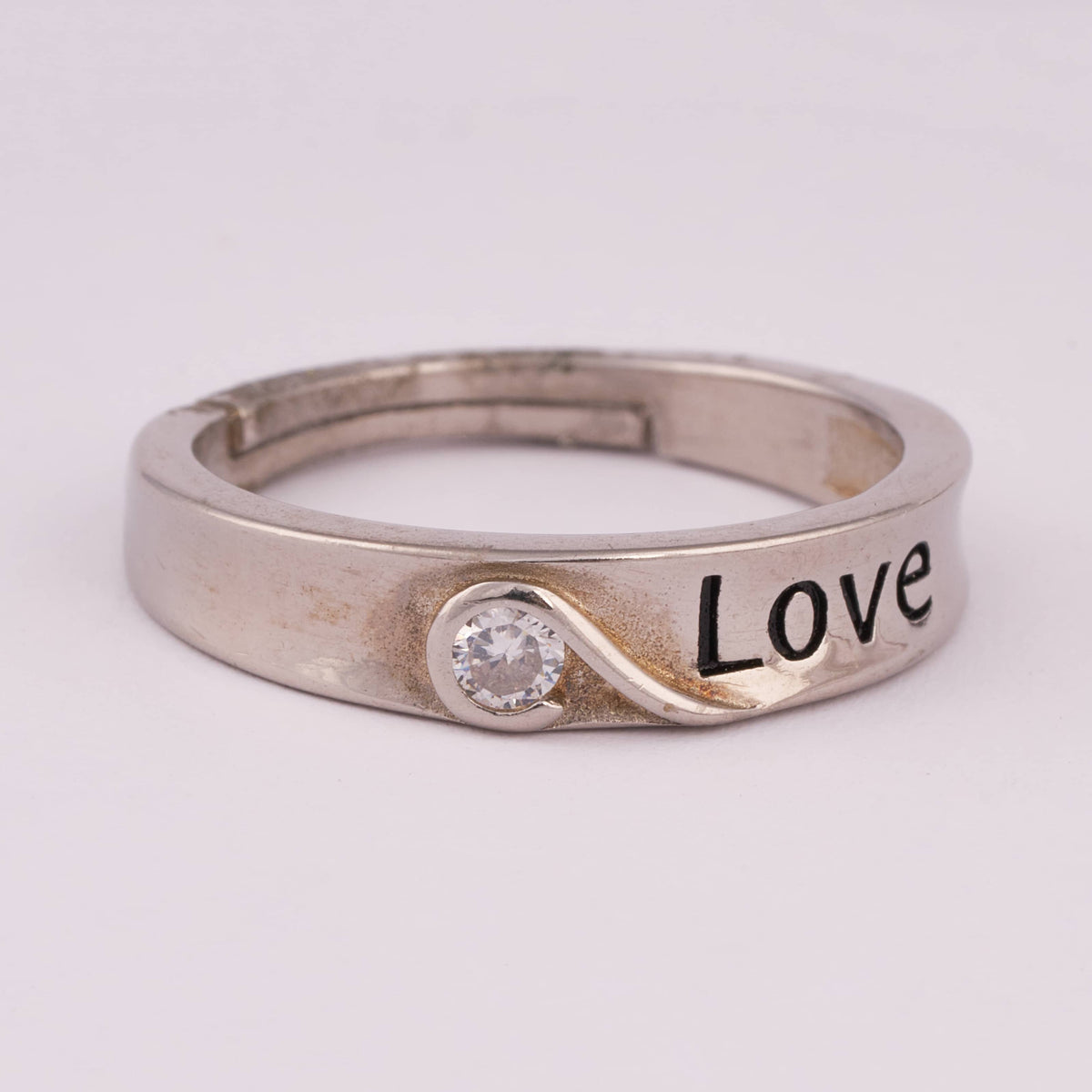 Silver Ring with 'LOVE' Engraving and Solitaire Stone