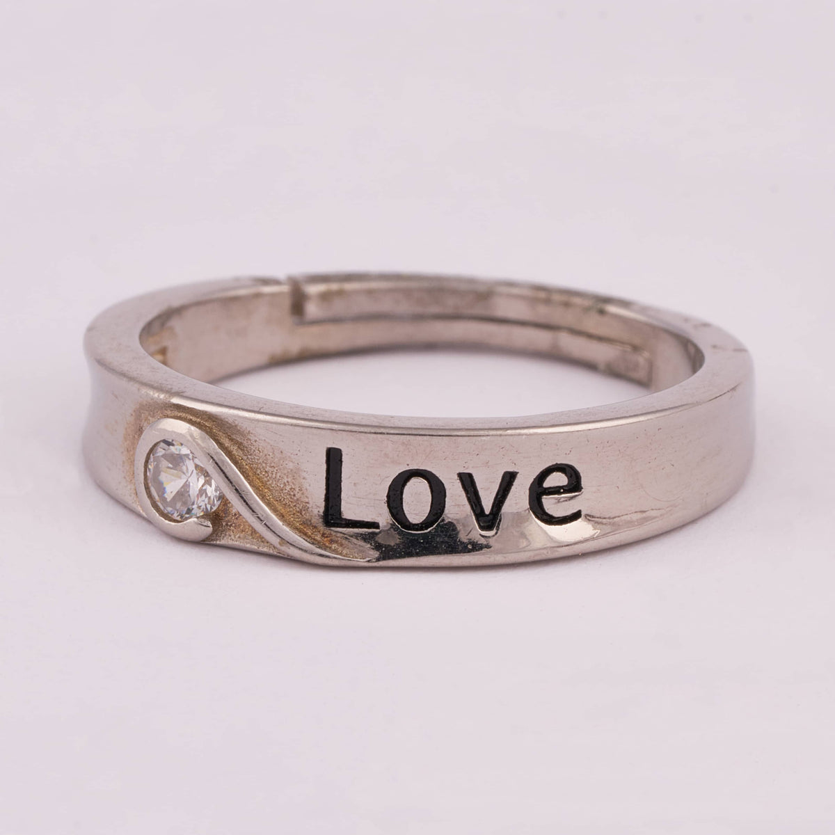Silver Ring with 'LOVE' Engraving and Solitaire Stone
