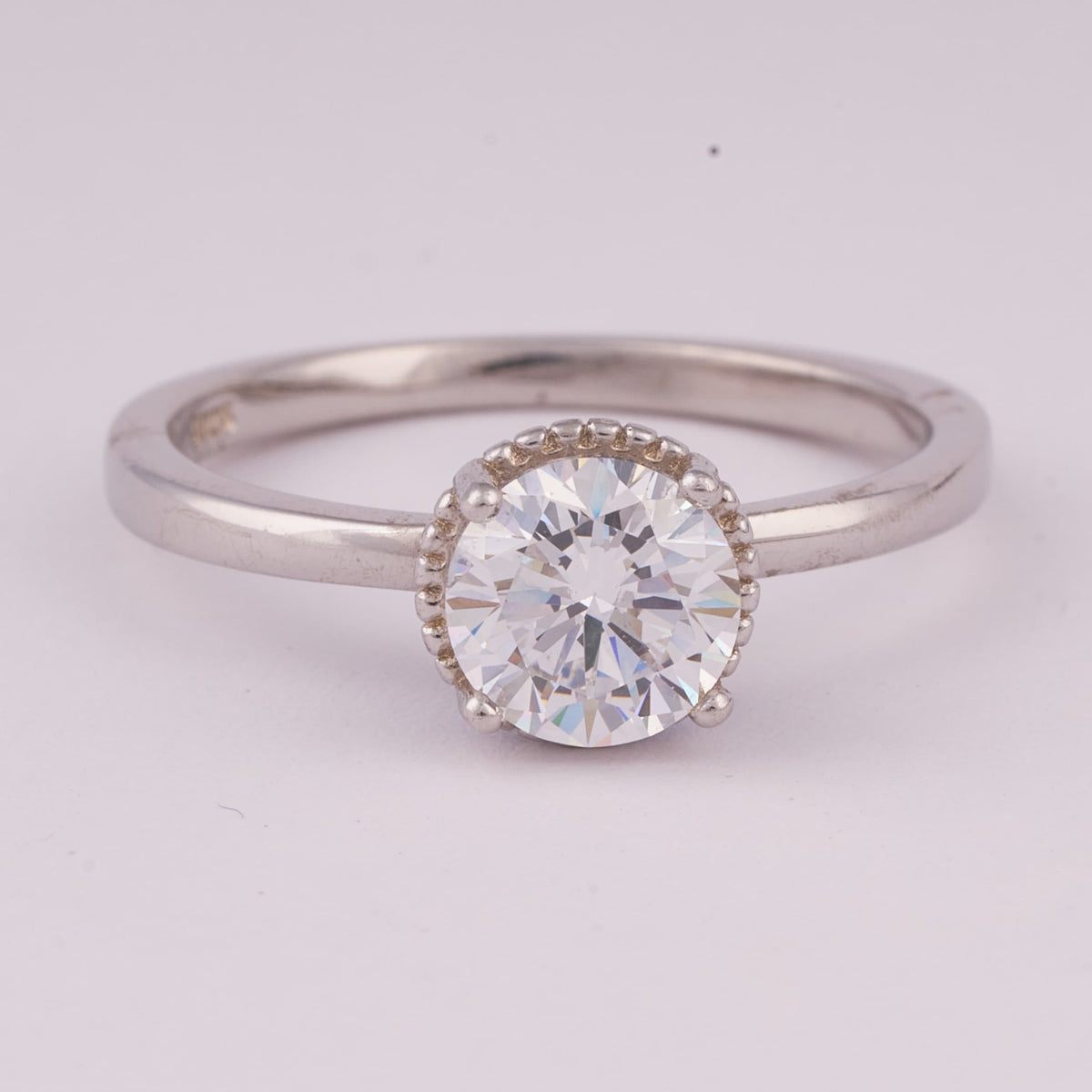 Silver Solitaire Ring with Beaded Halo Detail