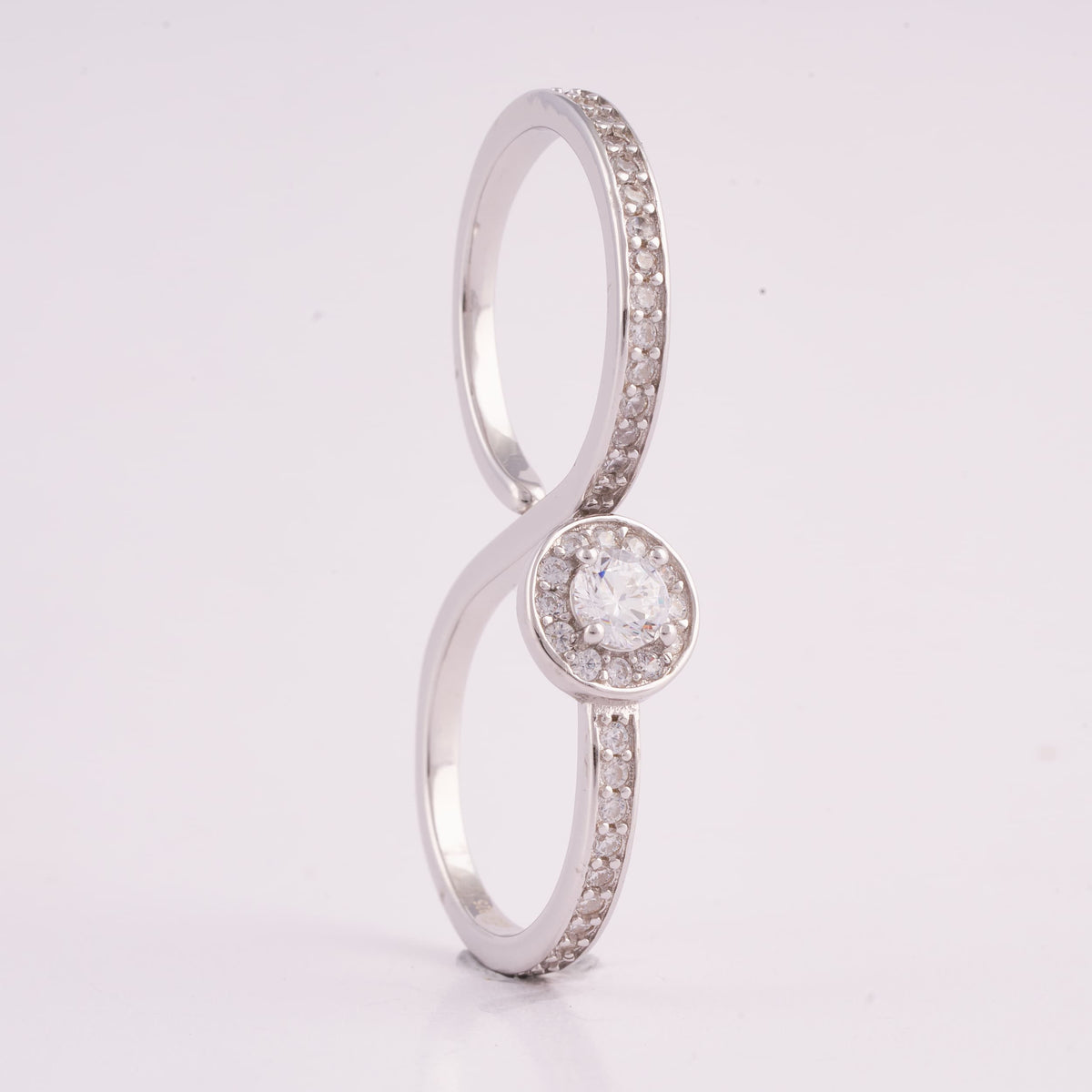 Silver Bypass Ring with Round Halo Stone
